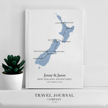 a map of new zealand and new zealand with a potted plant